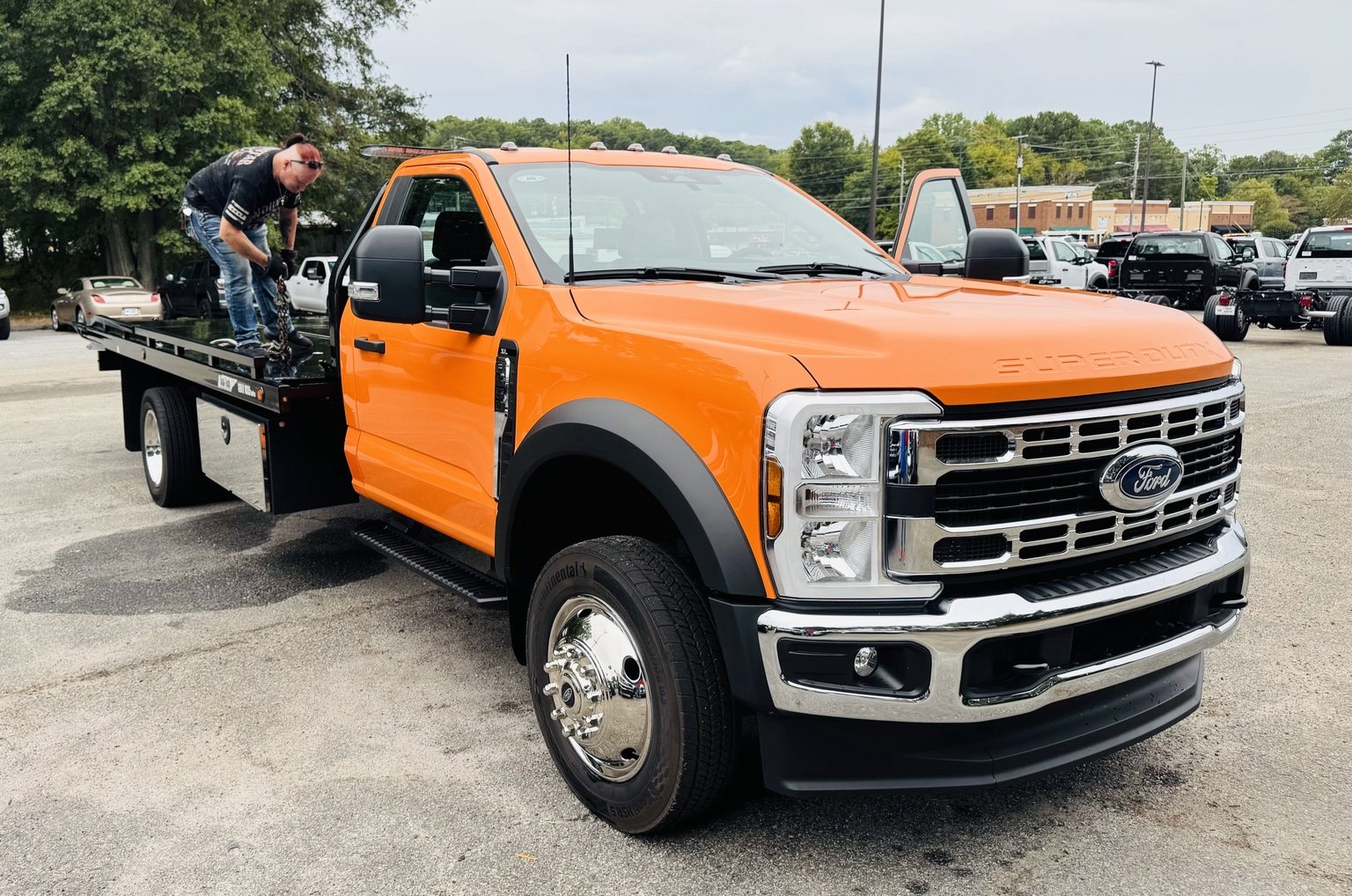 TowSmart flatbed preparing for transport